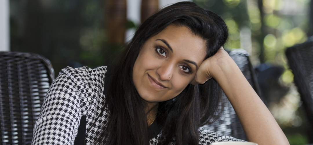 safetalk - woman looking at camera with hand on her head